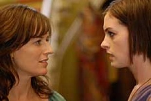 Rosemarie DeWitt as Rachel and Anne Hathaway as Kym