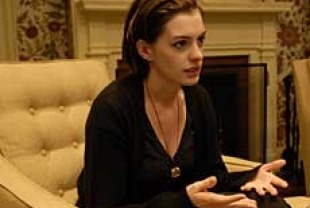 Anne Hathaway as Kym