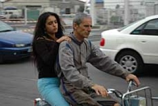 Hafsia Herzi as Rym and Habib Boufares as Slimane