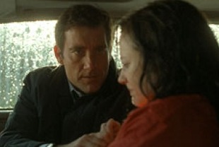 Clive Owen as Mac and Andrea Riseborough as Collette