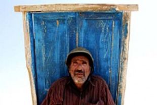 Reza Naji as Karim