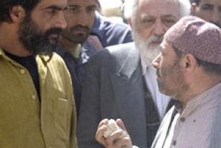 Navid Negahban as Ali and Parviz Sayyad as Hashem