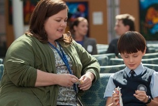 Melissa McCarthy as Maggie and Jaeden Lieberher as Oliver