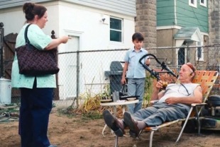 Melissa McCarthy as Maggie, Jaeden Lieberher as Oliver and Bill Murray as Vincent