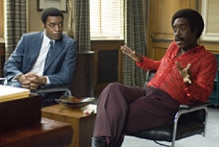 Chiwetel Ejiofor as Dewey Hughes and Don Cheadle as Petey