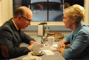 Ed Harris as Mr. Simon and Amy Maigan as Principal Kelner