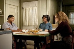 Octavia Spencer as Minny, Viola Davis as Aibileen, and Emma Stone as Skeeter