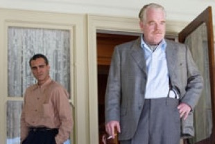 Joaquin Phoenix as Freddie Sutton and Philip Seymour Hoffman as Lancaster Dodd