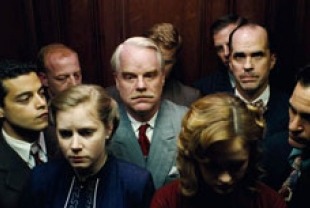 Amy Adams as Mary Sue Dodd and Philip Seymour Hoffman as Lancaster Dodd