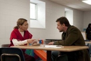 Russell Crowe as John Brennan and Elizabeth Banks as Lara