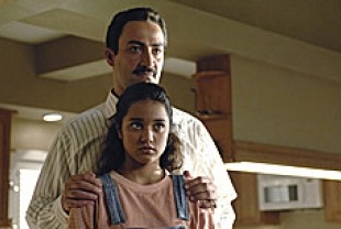 Summer Bishil as Jasira and Peter Macdissi as Peter