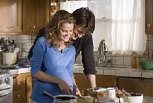 Keri Russell as Jenna and Nathan Fillon as Dr. Pomatter