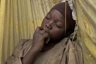 Rachel Mwanza as Komona