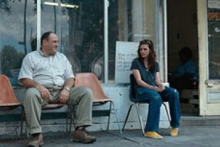 Kristen Stewart as Mallory and James Gandolfini as Doug Riley