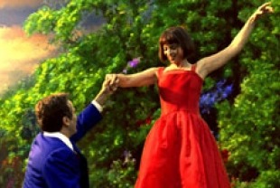 Robin Williams as Chris and Annabella Sciorra as Annie