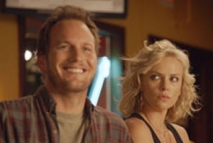 Patrick Wilson as Buddy and Charlize Theron as Mavis